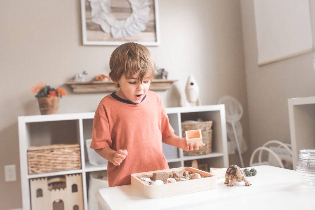 Boy playing in bedroom